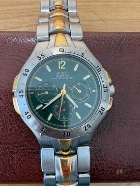 GUESS Two-Tone Men's Stainless Steel Watch in Silver and Gold with Green Dial